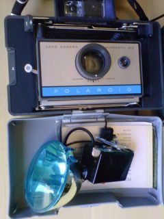 Cameras and Polaroid Film