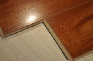  Pad Attached High Gloss AC3 HDF Beveled Laminate Wood Flooring