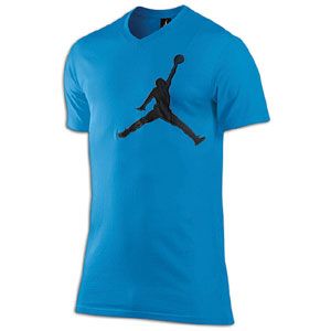 The Jordan Jumpy V Neck T Shirt features an oversized Jumpman cut and