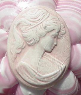 Joe St Clair Pink Cameo Sulfide Glass Paperweight. Pink and white fold