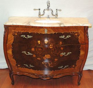 Bombe Commode with installed Kohler sink & chrome faucets, marble top