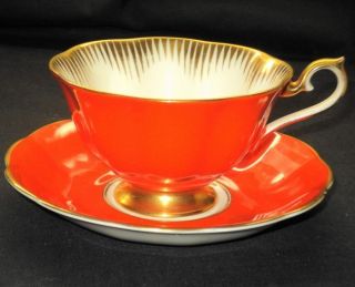 ROYAL ALBERT ORANGE GOLD WIDE FOOTED TEA CUP AND SAUCER chip on saucer