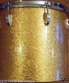 GOLD SPARKLE DRUM WRAP SKINS. GOES RIGHT OVER YOUR OLD DRUM WRAP