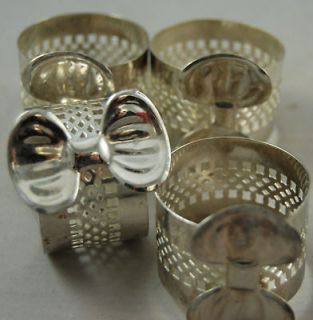 Lot of 4 Open Work Silver Plated Napkin Rings With Bows