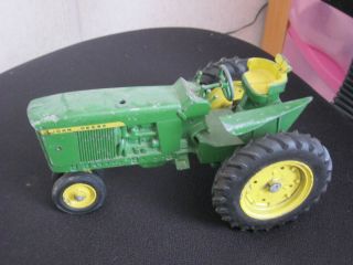 Vintage John Deere Toy Tractor with Diecast Wheels