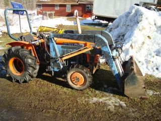 Kubota L 225 DT 4 wheel drive compact tractor with front loader Diesel