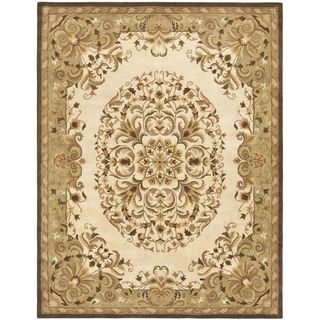 Handmade Heritage Beige Wool Rug (76 X 96) (BeigePattern OrientalMeasures 0.625 inch thickTip We recommend the use of a non skid pad to keep the rug in place on smooth surfaces.All rug sizes are approximate. Due to the difference of monitor colors, some